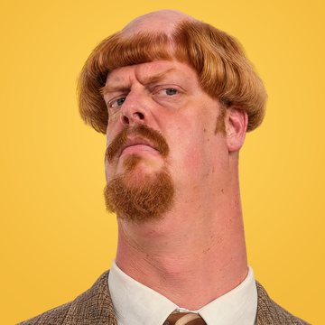 Photo of Harold Puddington: ginger bowl cut, side-eye, tweed jacket